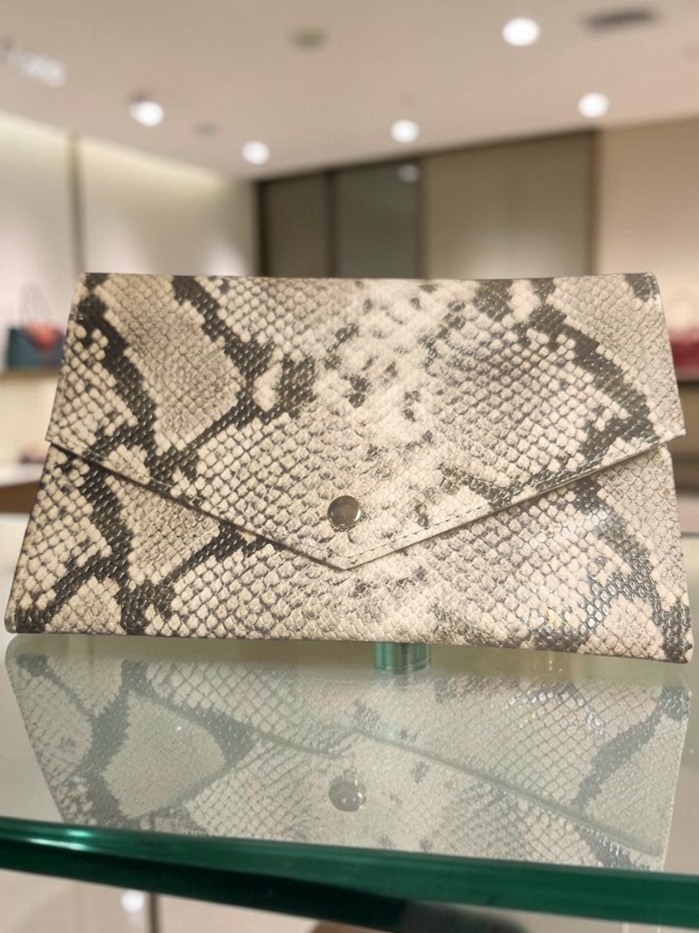 Aldo Snake-Print Envelope Clutch in Cream and Black